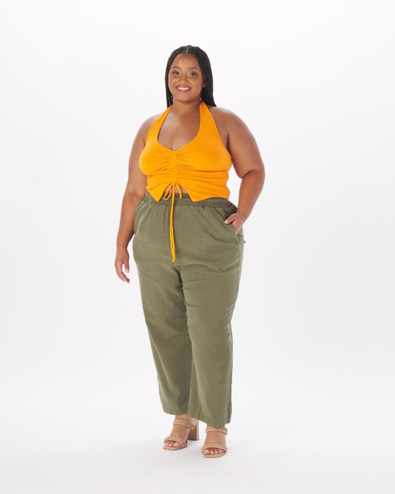 Front of a model wearing a size 5X Emma Ruched Halter Top in Royal in Saffron by What Lo Wants. | dia_product_style_image_id:237951